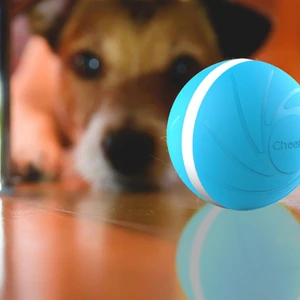 dog with Peppy Pet Ball under couch